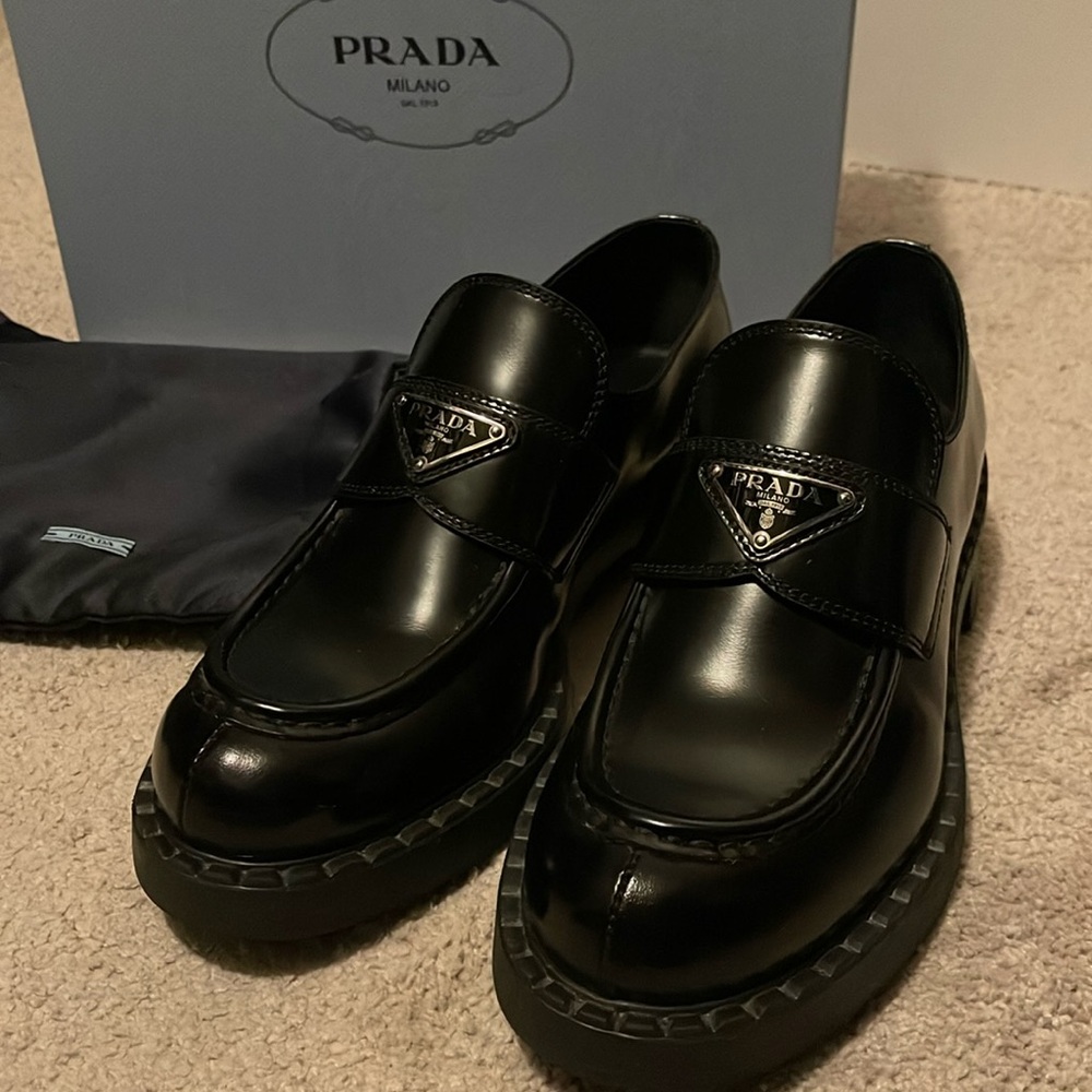 EXCELLENT condition Prada loafer in black. Hardly worn.